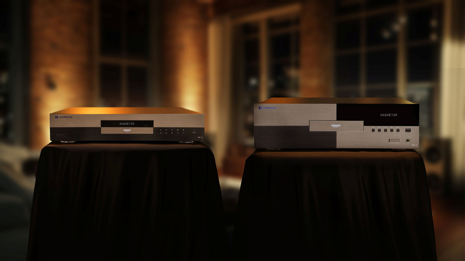 Two Magnetar MKII players in a luxury home theater environment.