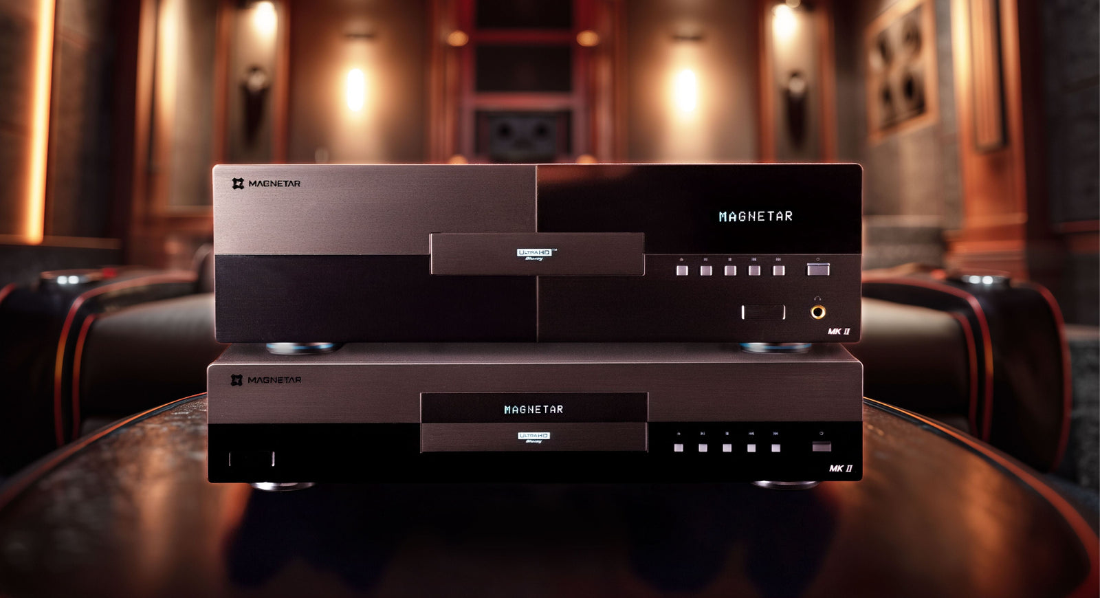 A Magnetar UDP900 MKII and UDP800 MKII in a luxury home theater setting.